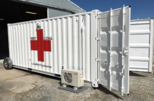 A shipping container converted to a First aid station, used as a designated area for treating minor injuries. 