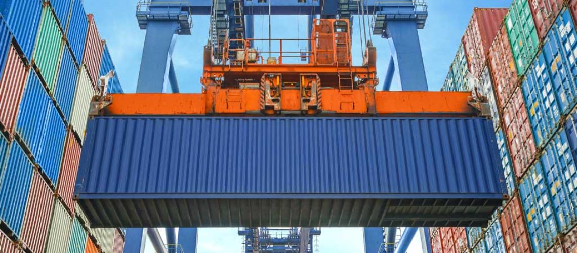 Shipping container delivery with crane